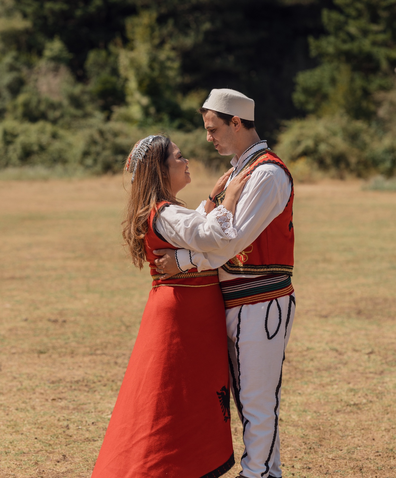 Juxhen and Amy together in traditional Albanian clothing
